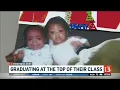 Twins graduate at the top of their class