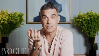 Download Robbie Williams Breaks Down 18 Memorable Looks From 1990 To Now | Life in Looks MP3