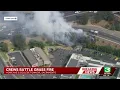 Crews respond to grass fire near Highway 50 on-ramp in Sacramento