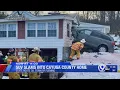 SUV slams into Cayuga County home