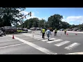 Fairfax county police escorting a citizen at a gas leak scene