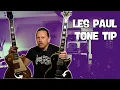 Try to find this setting on your Les Paul