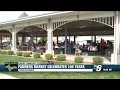 Escanaba vendors and shoppers celebrate the marketplace s birt ay