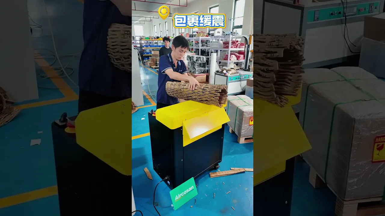 Cardboard Expander Machine, turns waste corrugated cartons into fluffy cushion filling material.