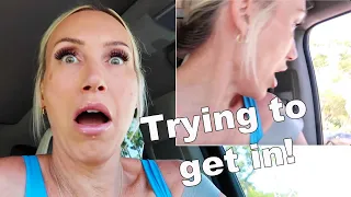 Stranger is trying to get in my car!