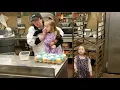 Carmela and Layla Make cup cakes at Big Y for their Birt ays with Auntie Amanda