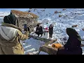 Lagu Zahra baking local bread and Masoud Nika going to the mountain to collect firewood