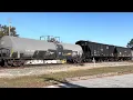 RJ Corman Railroad Company train passing through Fuquay-Varina NC