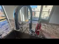 Tightening a loose kitchen faucet with the Rigid Sink Wrench