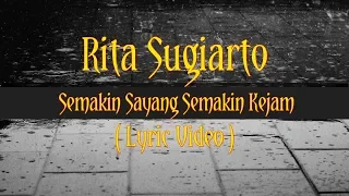 Download RITA SUGIARTO - SEMAKIN SAYANG SEMAKIN KEJAM (Lyric Video) MP3