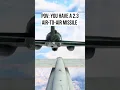 AIR-T0-AIR MISSILE AT 2 3