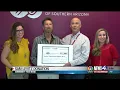 Sam Levitz Furniture gives big donation to food bank