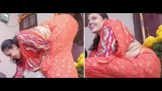 saree aunty with thick belly and deep navel