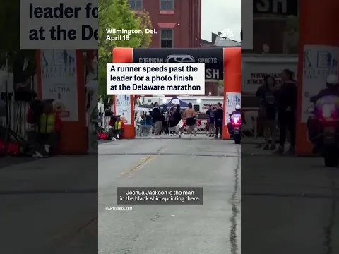 Runner speeds past Delaware marathon leader for photo finish