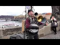 One Man Band Plays Multiple Instruments on Prague Charles Bridge