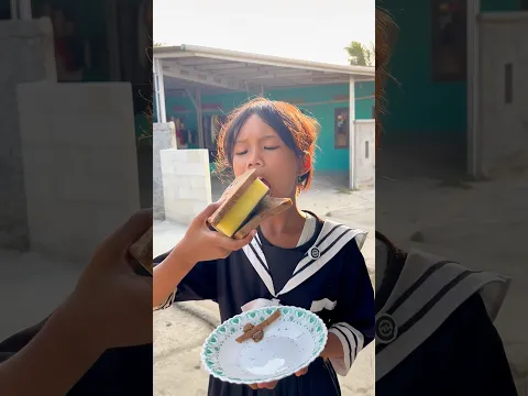 Merri Makan Roti Spon