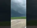 Amazing storm south of Bloomington IL w wall cloud and lightning strike