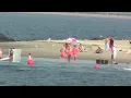 Dakota Fanning and Elizabeth Olsen wear bikinis in Coney Island