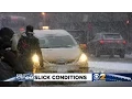 Wet Snow Creates Slick Driving Conditions In Manhattan