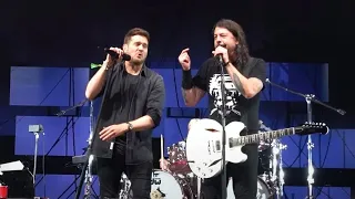 Michael Buble pretends to be fan at Foo Fighters concert