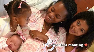 Siblings meeting baby #5 for the first time