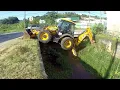 Download Lagu Retroescavadeira JCB 4CX descendo no córrego(JCB 4CX backhoe loader going down stream