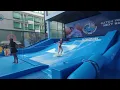 Petite asian girl bikini indoor surfing