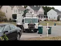Henrico county trash truck picking up the neighborhoods trash