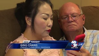 Massage parlor owner speaks to after raid