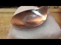 Water freezes and cracks on spoon not sped up