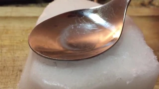 Water freezes and cracks on spoon not sped up