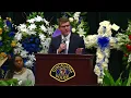 Tuscaloosa Mayor Walt Maddox speaks at Officer Cousette funeral