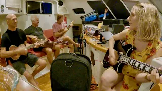 A Boat, Guitars, Ukuleles, and a Whale