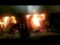 Firing up the custom made grill Oswego Grill