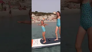 Surfing small waves at Villasimius Sardinia