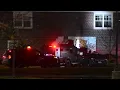 Truck crashes into Uptown Bay City townhome