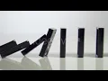 Row Of Dominoes With One Falling Over | Stock Footage - Videohive