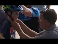Potsdam police law firm team up to give away bike helmets
