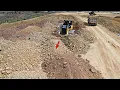 Lagu Powerful Bulldozers SHANTUI DH17c2 push soil fill up with 25ton Dump trucks unloading.