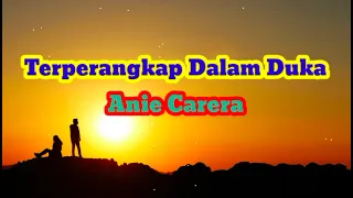 terperangkap dalam duka anie carera lirik lagu 