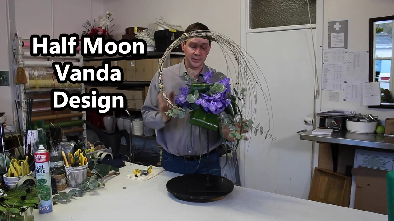 HALF MOON VANDA DESIGN ORCHIDS, STEELGRASS, PHORMIUM