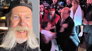 Paul Heyman shoves child