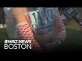 Boston Marathon runners head to the starting line