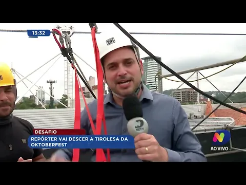 Desafio: repórter desce a tirolesa da Oktoberfest ao vivo