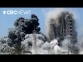 Download Lagu Israel bombs Gaza high-rise; Hamas releases hostage video