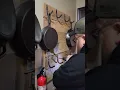 Reclaimed wood wall with hand forged hooks for cast iron skillets
