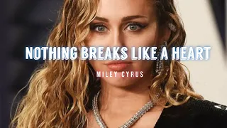Download NOTHING BREAKS LIKE A HEART - Miley Cyrus (Lyrics Video) MP3