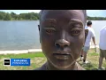 Sunisa Lee surprised with bronze bust of herself at St Paul park