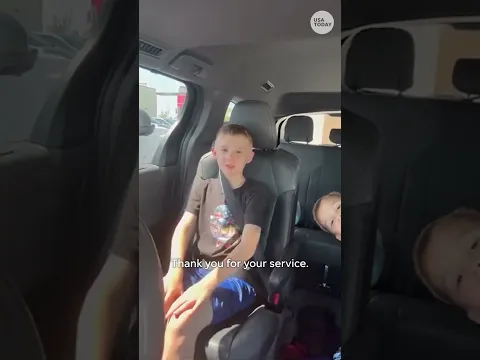Two boys show gratitude to soldiers with a simple but powerful gesture