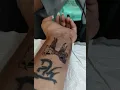 wrist tattoo ribbon bow